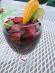 The same fruit used in the Simple Summer Sangria recipe can easily create a bright garnish and presentation.